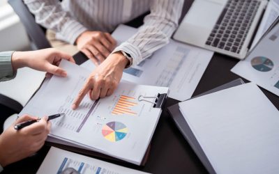 Investor reviewing commercial property due diligence documents in Texarkana