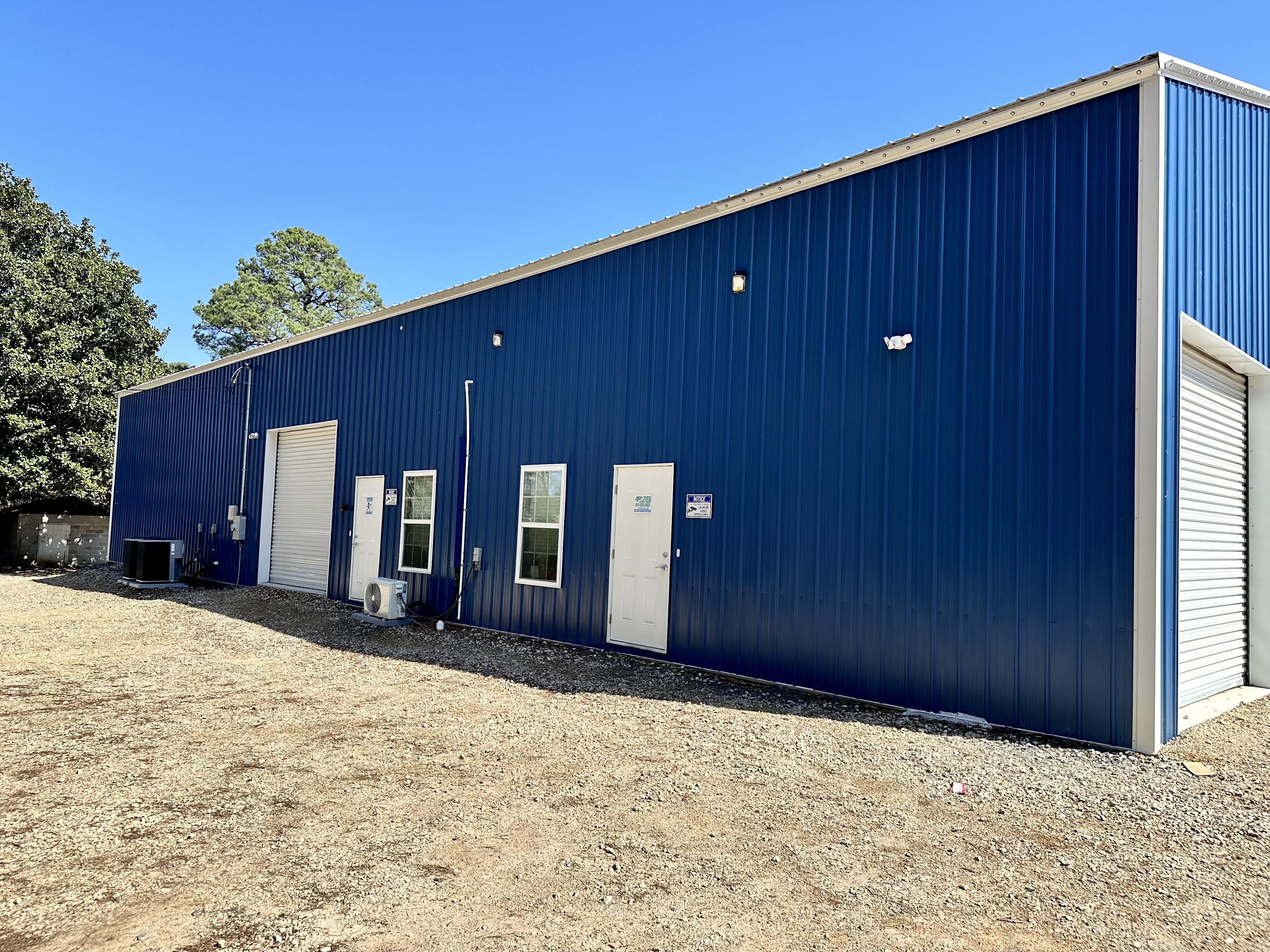 Two side door entry points as well as another 10x10 roll up door.