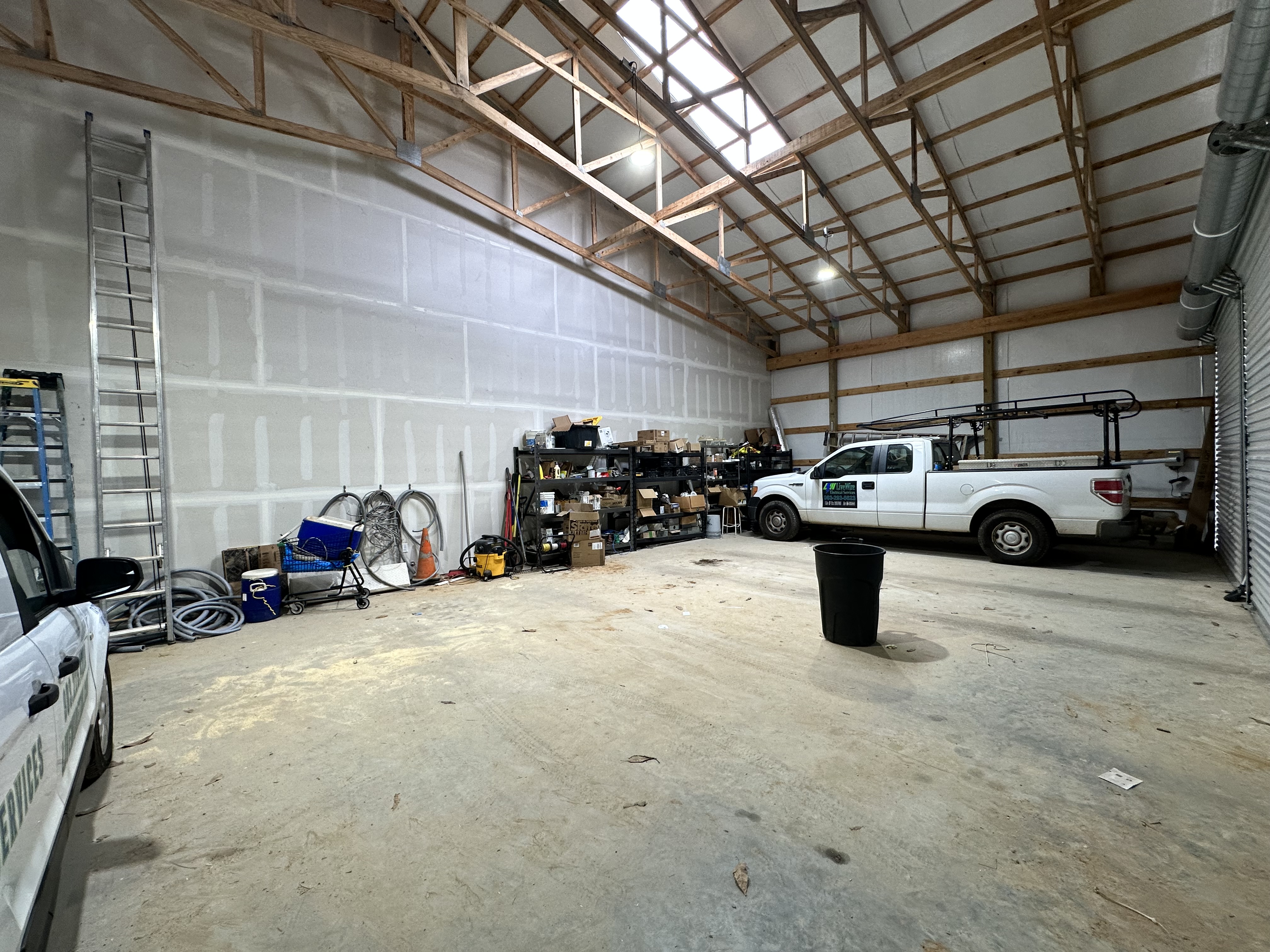 Garage bay area that is not climate controlled. 1,410 square feet to park or store product. 